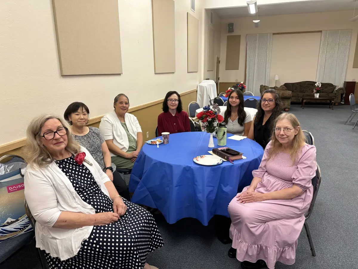 Women of the church gathered around a table for Women’s Bible Study